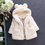 A girl's fur coat for autumn and winter - D&A