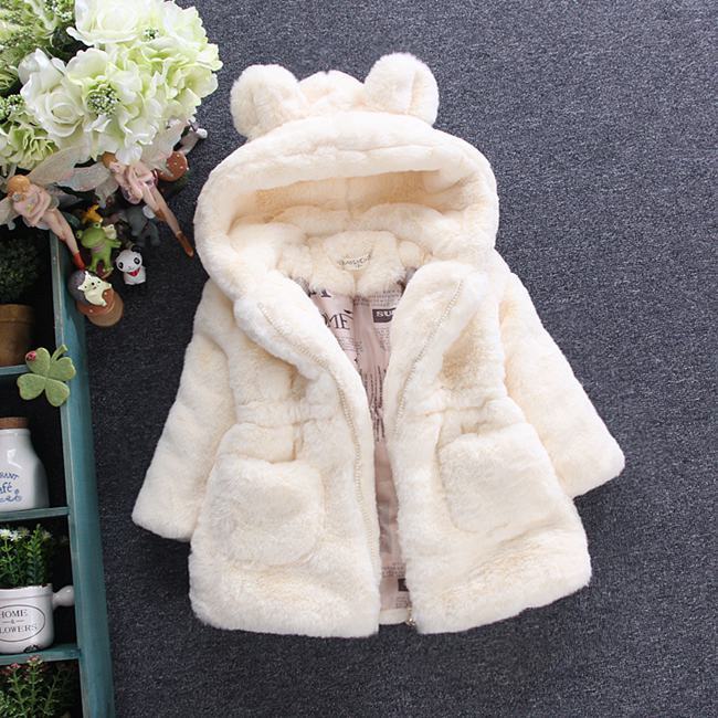A girl's fur coat for autumn and winter - D&A